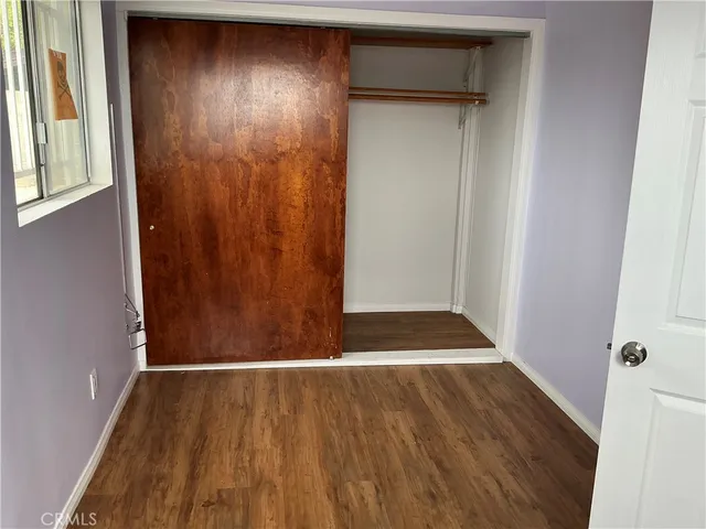 a view of a kitchen from the hallway