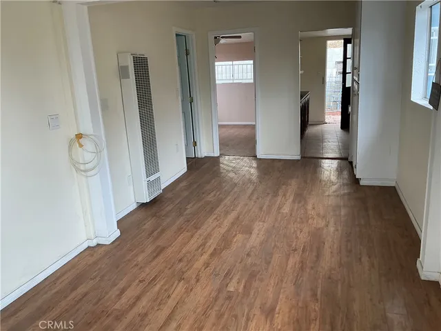 a bathroom with a tub and a window