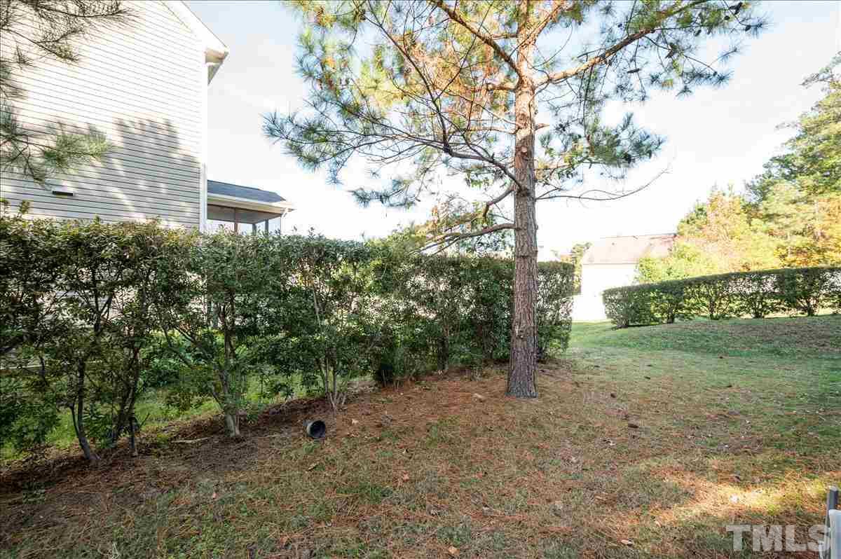 4625 Pat Reed Road Raleigh, NC 27616 - Photo 23 of 28 a view of a field with lots of bushes