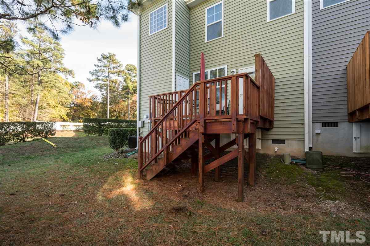 4625 Pat Reed Road Raleigh, NC 27616 - Photo 24 of 28 a view of a house with yard and sitting area