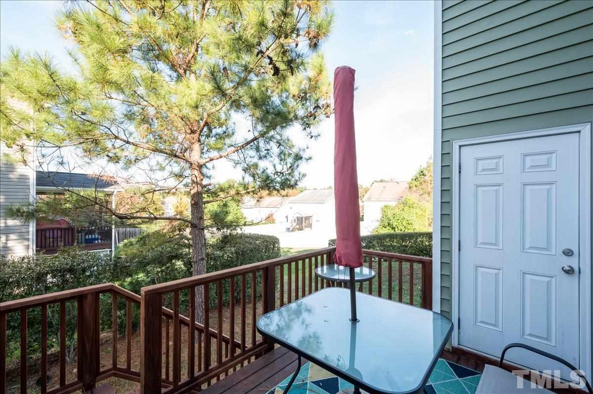 4625 Pat Reed Road Raleigh, NC 27616 - Photo 26 of 28 a view of a balcony with furniture