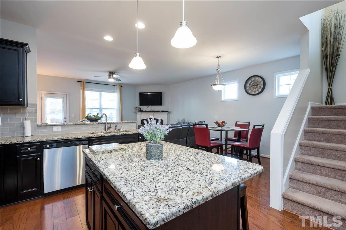 4625 Pat Reed Road Raleigh, NC 27616 - Photo 7 of 28 a kitchen with granite countertop lots of counter top space