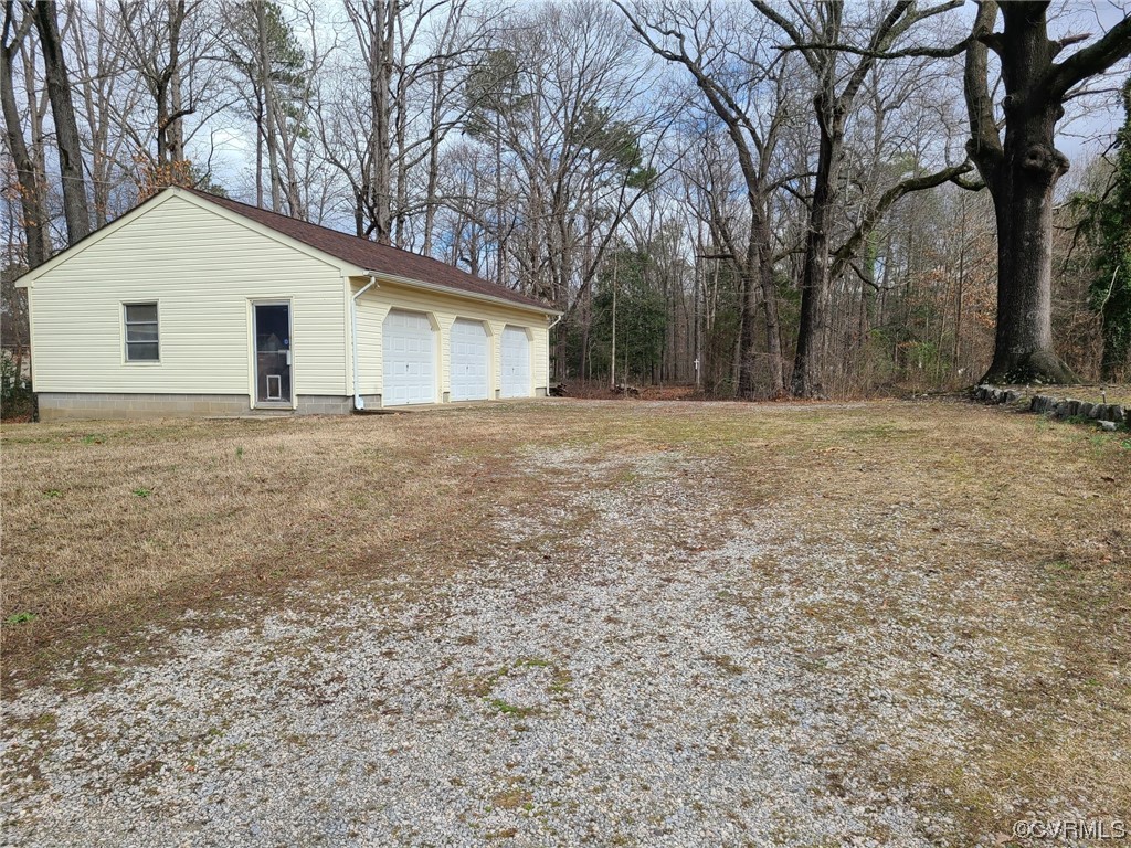 11231 Chester Road Chester, VA 23831 - Photo 15 of 18 a view of large trees with barn in the background