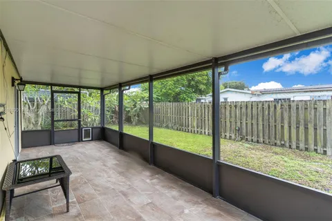 a view of a storage & utility room with closet dryer and washer
