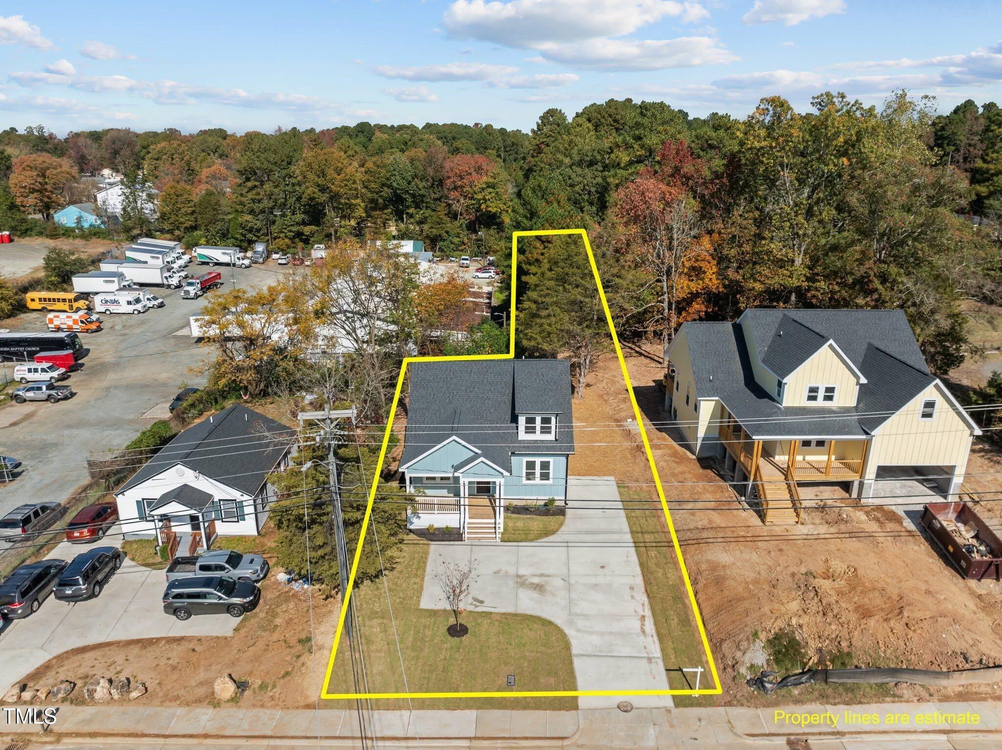 2015 Cheek Road Durham, NC 27704 - Photo 12 of 12 an aerial view of a house with a ocean view