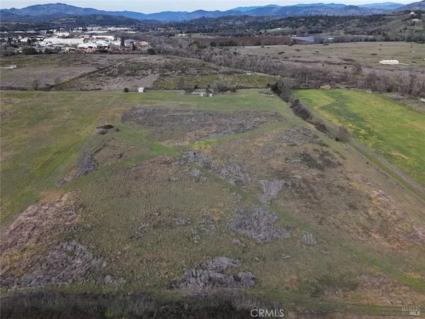 a view of a yard with an ocean
