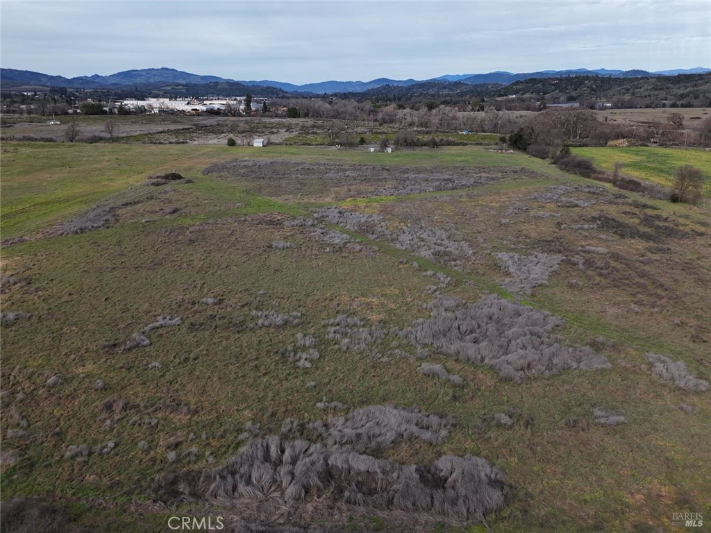 585 Kunzler Ranch Road Ukiah, CA 95482 - Photo 9 of 10 a view of lake with mountain