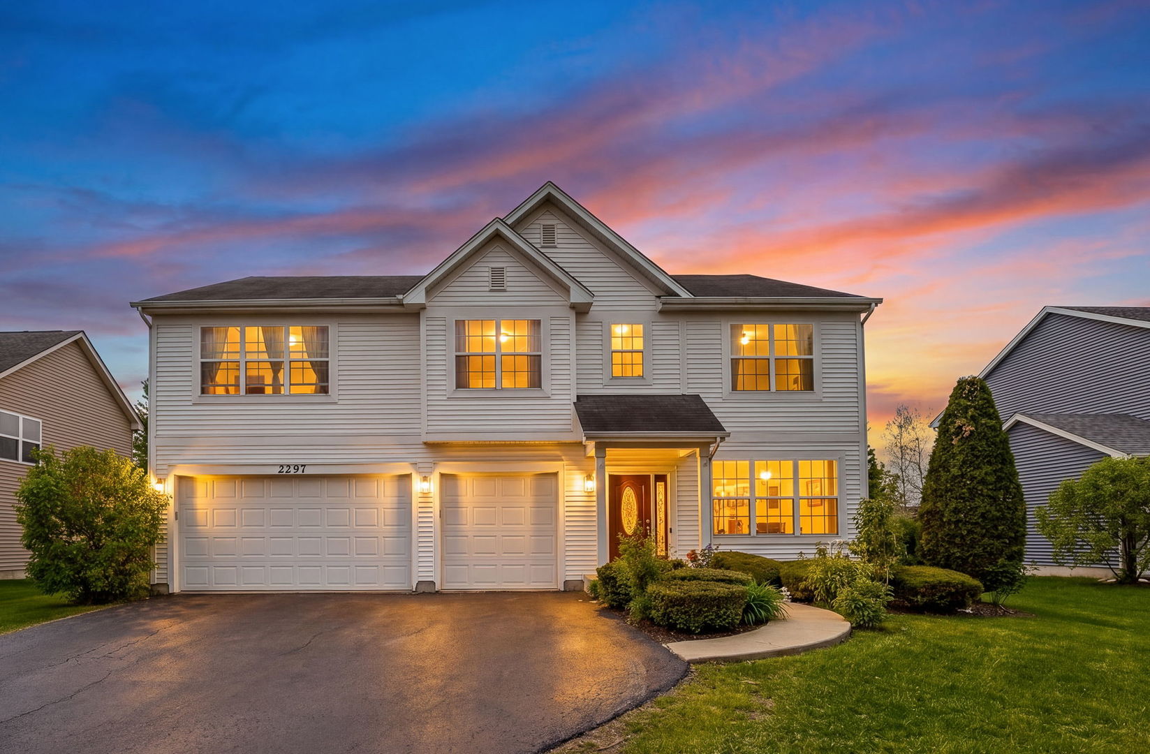 2297 Deerpath Road Bolingbrook, IL 60490 - Photo 1 of 46 a front view of a house with garden