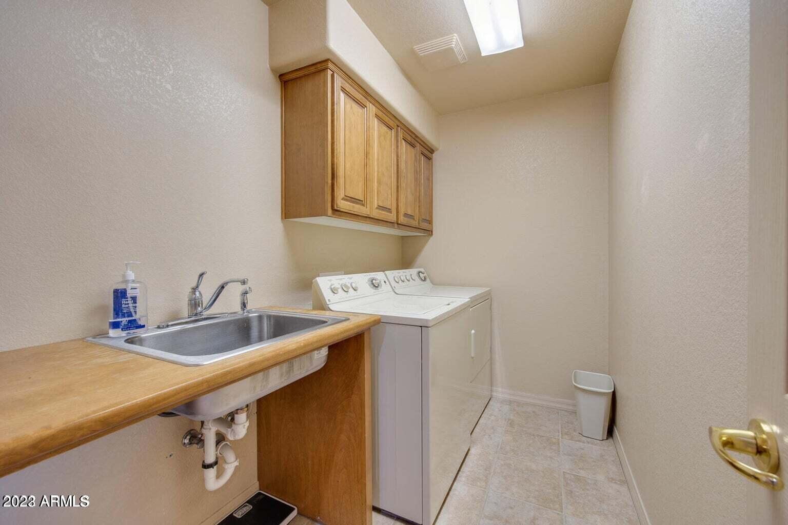 25603 North Sago Drive Rio Verde, AZ 85263 - Photo 14 of 25 a bathroom with a sink and a toilet