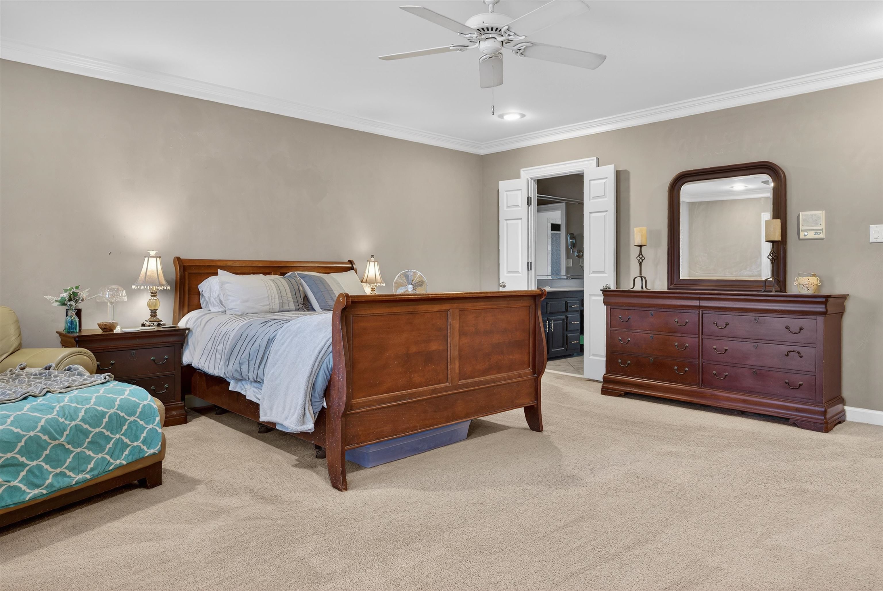 1195 Frank Road Collierville, TN 38017 - Photo 20 of 35 Bedroom with carpet floors, ornamental molding, ceiling fan, and connected bathroom