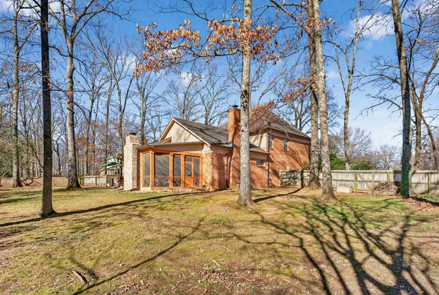 a house with trees in front of it