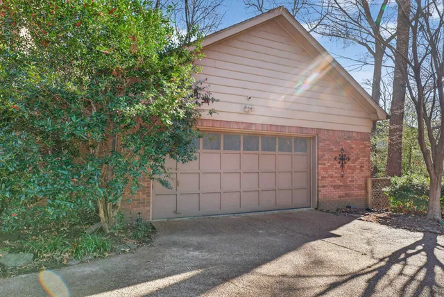 a view of a house with a garage