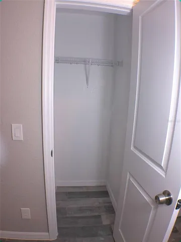 a living room with fireplace furniture and decor