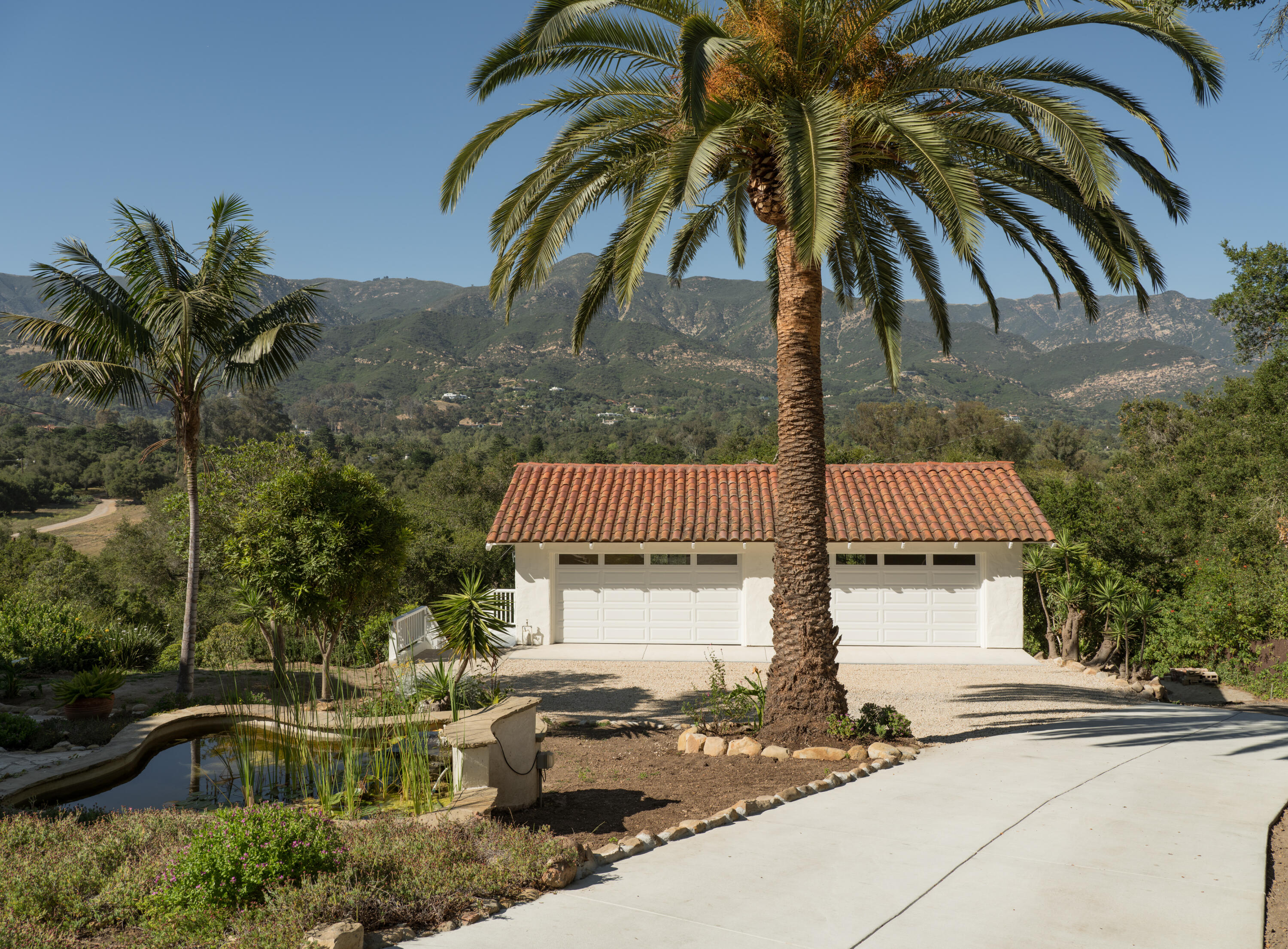 939 Arcady Road Santa Barbara, CA 93108 - Photo 24 of 28 a front view of a house with yard and trees