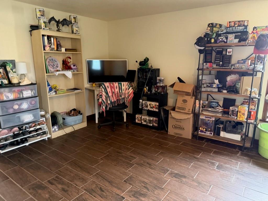 4050 Old Anson Road Abilene, TX 79601 - Photo 21 of 40 a living room with lots of furniture and a flat screen tv