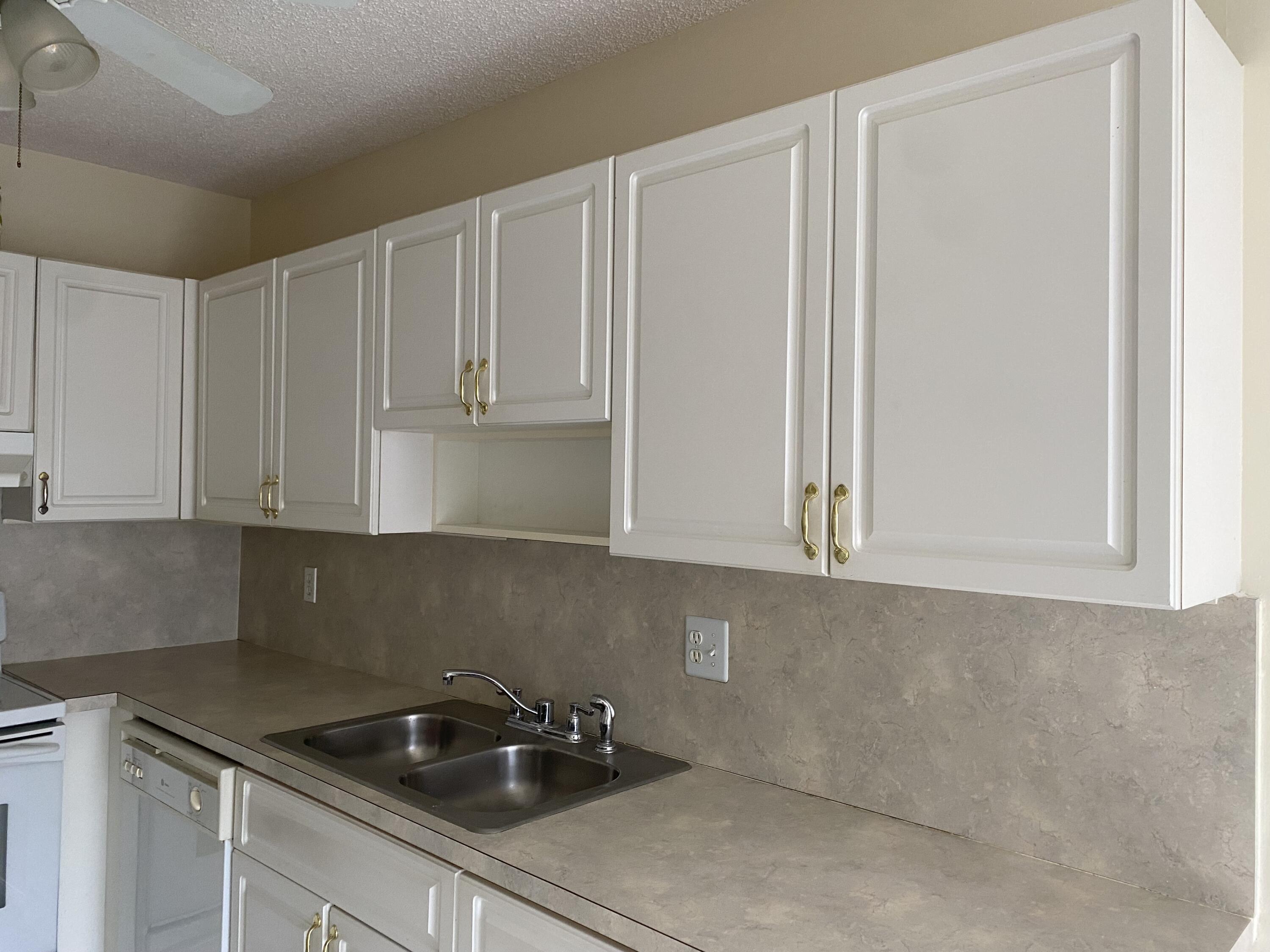8665 Chevy Chase Drive, Unit 113 Boca Raton, FL 33433 - Photo 12 of 42 IMG_4839