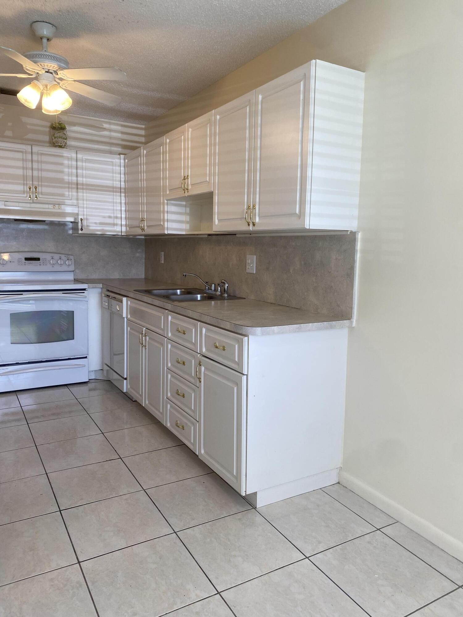8665 Chevy Chase Drive, Unit 113 Boca Raton, FL 33433 - Photo 31 of 42 IMG_4773