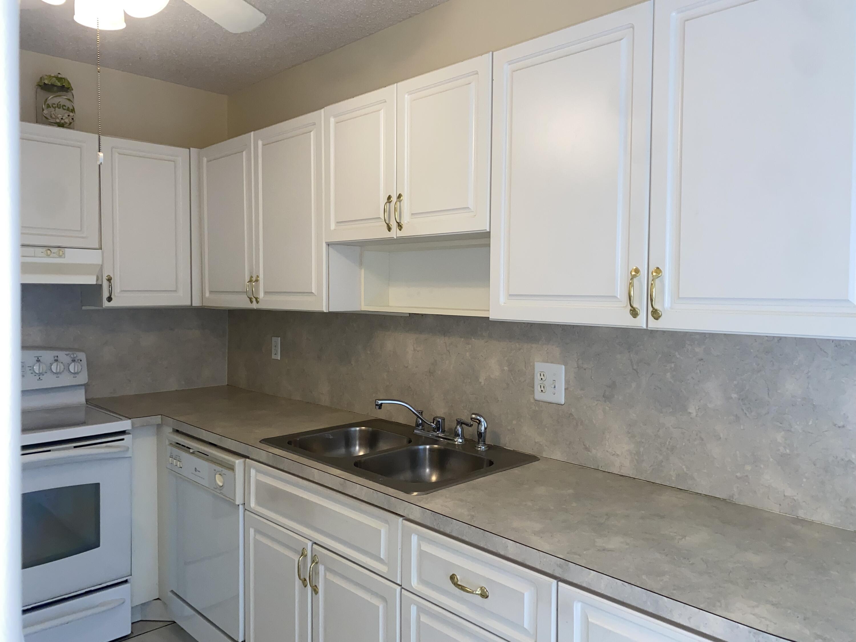 8665 Chevy Chase Drive, Unit 113 Boca Raton, FL 33433 - Photo 5 of 42 IMG_4998