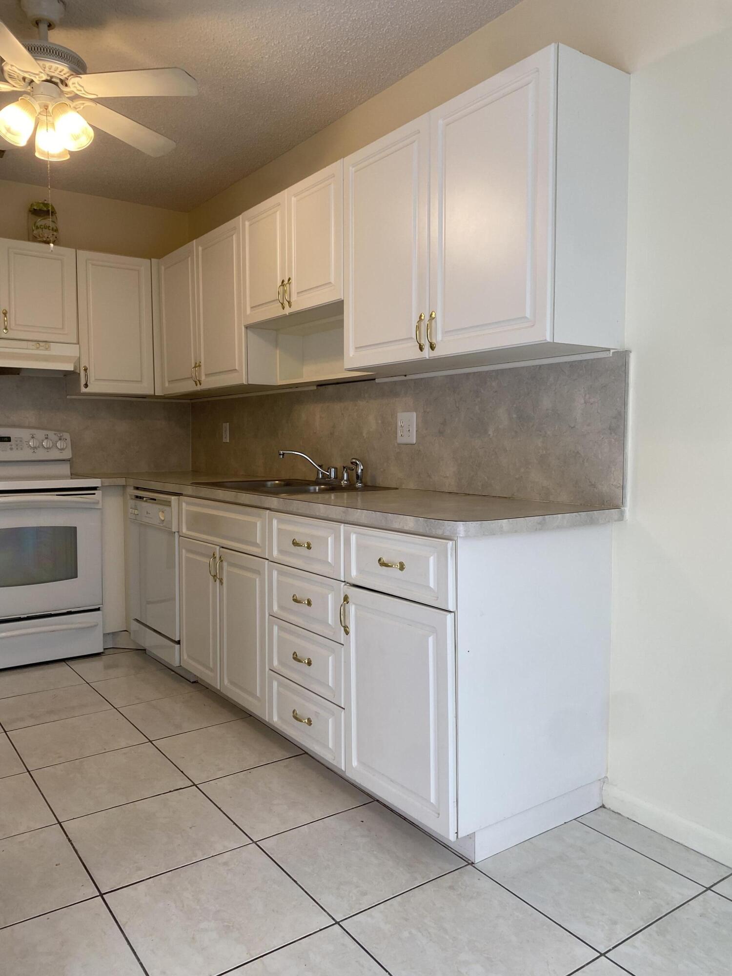 8665 Chevy Chase Drive, Unit 113 Boca Raton, FL 33433 - Photo 9 of 42 IMG_5006