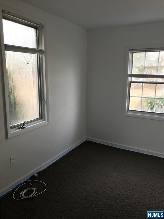 1 Cedar Lane Paramus, NJ 07652 - Photo 10 of 13 an empty room with a window