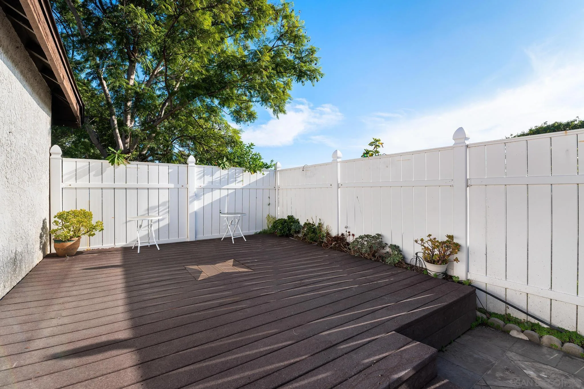 3002 Highlands Way Spring Valley, CA 91977 - Photo 20 of 21 a view of a backyard with wooden fence