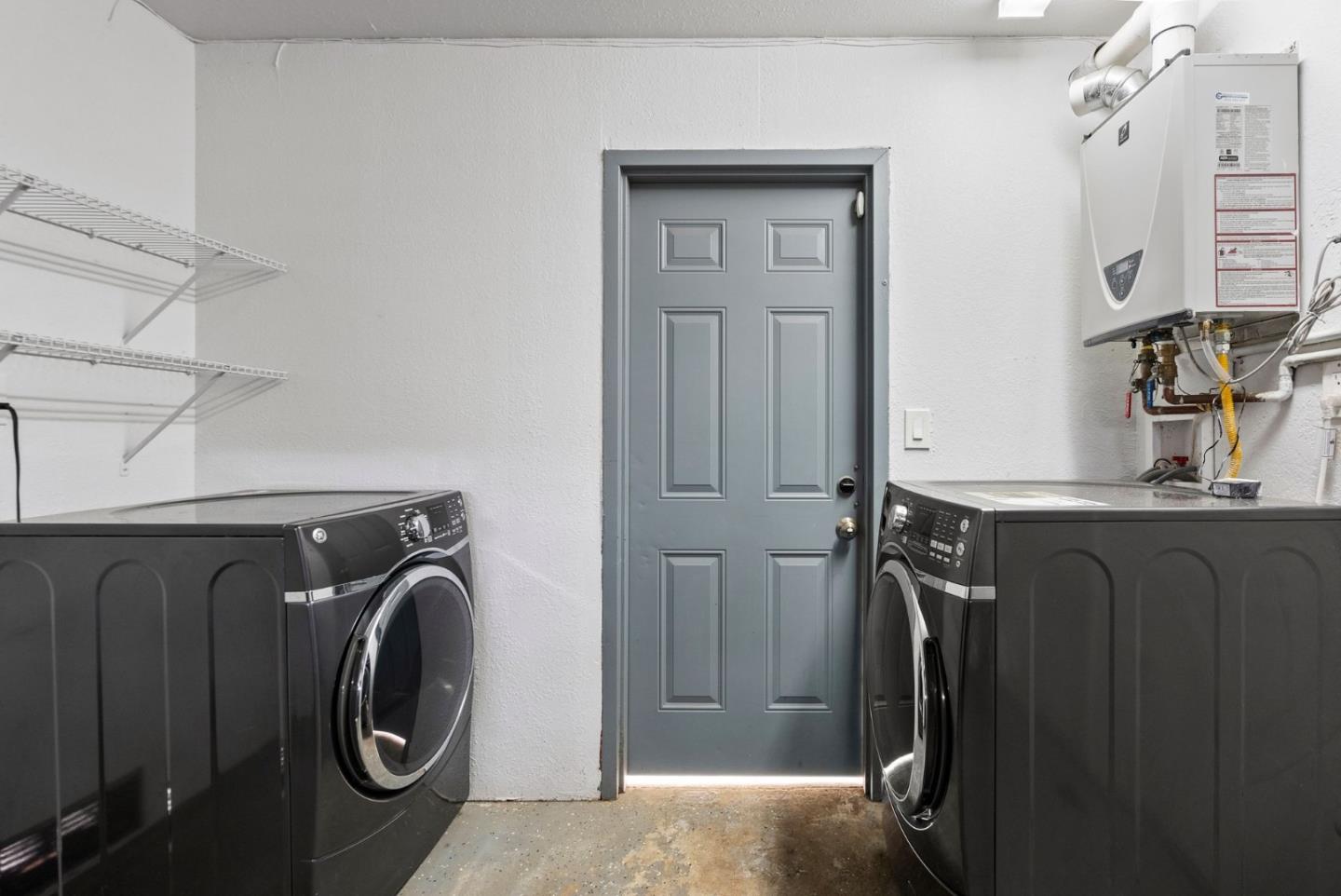 589 Inverness Drive Pacifica, CA 94044 - Photo 13 of 21 a utility room with dryer and washer