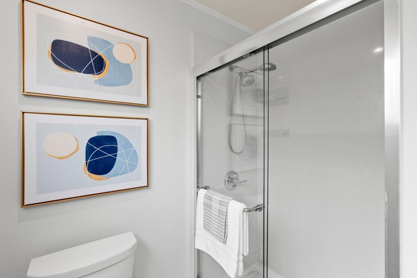 589 Inverness Drive Pacifica, CA 94044 - Photo 15 of 21 a bathroom with a toilet and a shower