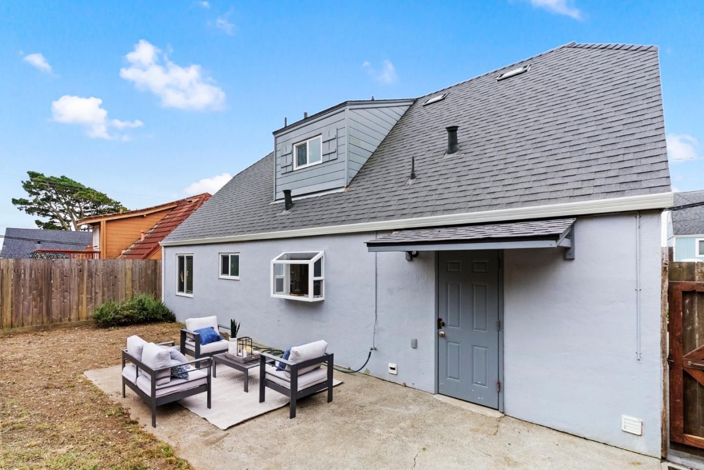 589 Inverness Drive Pacifica, CA 94044 - Photo 16 of 21 a house view with a backyard space