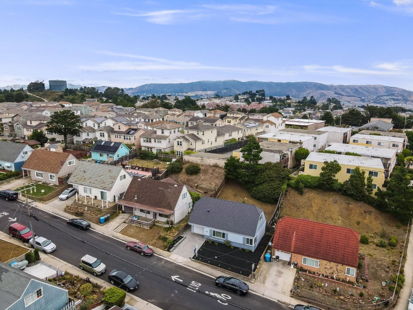 589 Inverness Drive Pacifica, CA 94044 - Photo 19 of 21 an aerial view of a city with lots of residential buildings