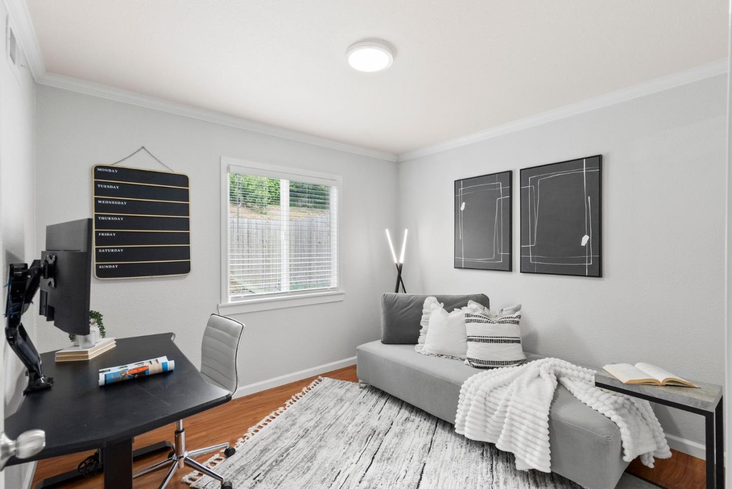 589 Inverness Drive Pacifica, CA 94044 - Photo 8 of 21 a bedroom with furniture and a window