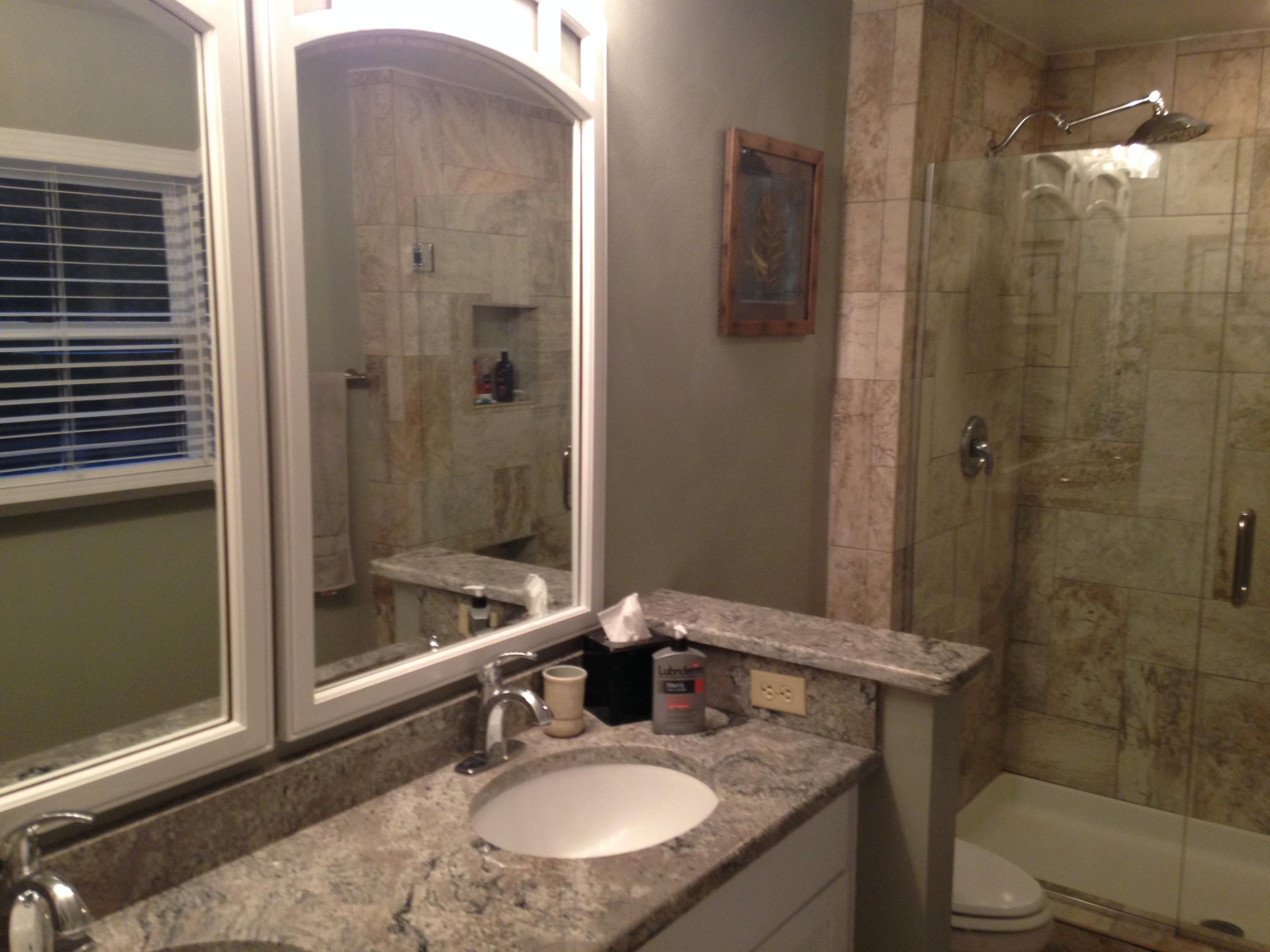 2205 Ridge Road Roanoke, VA 24014 - Photo 17 of 62 a bathroom with a granite countertop sink a mirror and shower