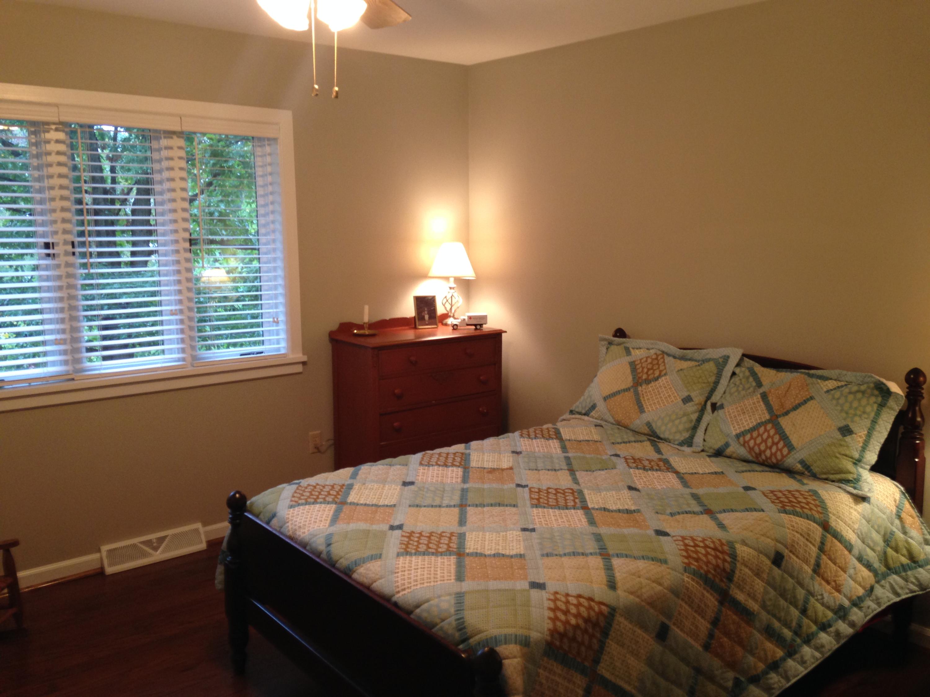 2205 Ridge Road Roanoke, VA 24014 - Photo 18 of 62 a bed sitting in a bedroom next to a window