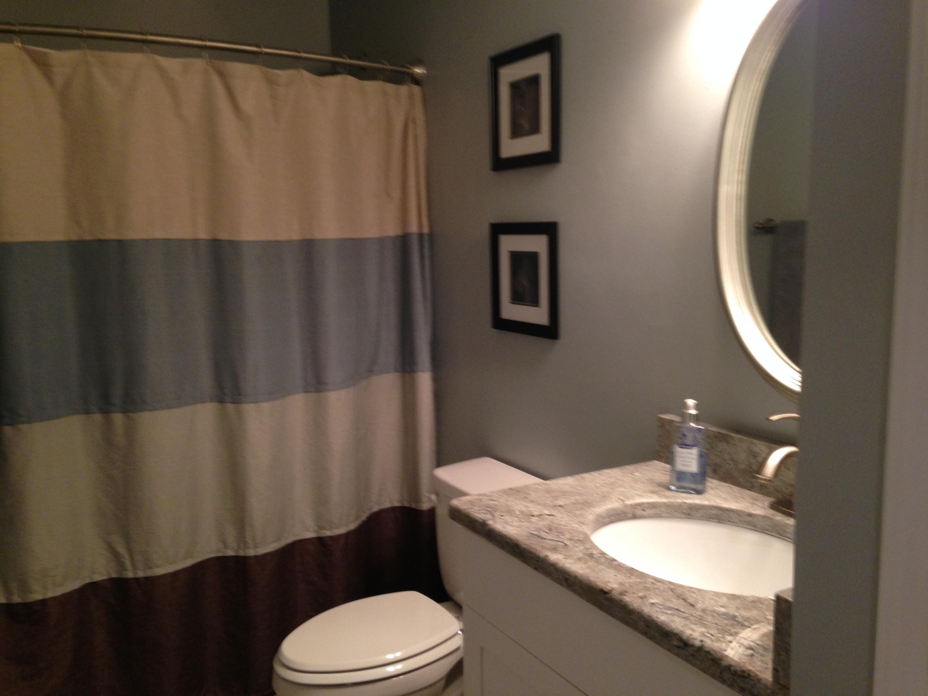 2205 Ridge Road Roanoke, VA 24014 - Photo 24 of 62 a bathroom with a granite countertop sink toilet and a mirror