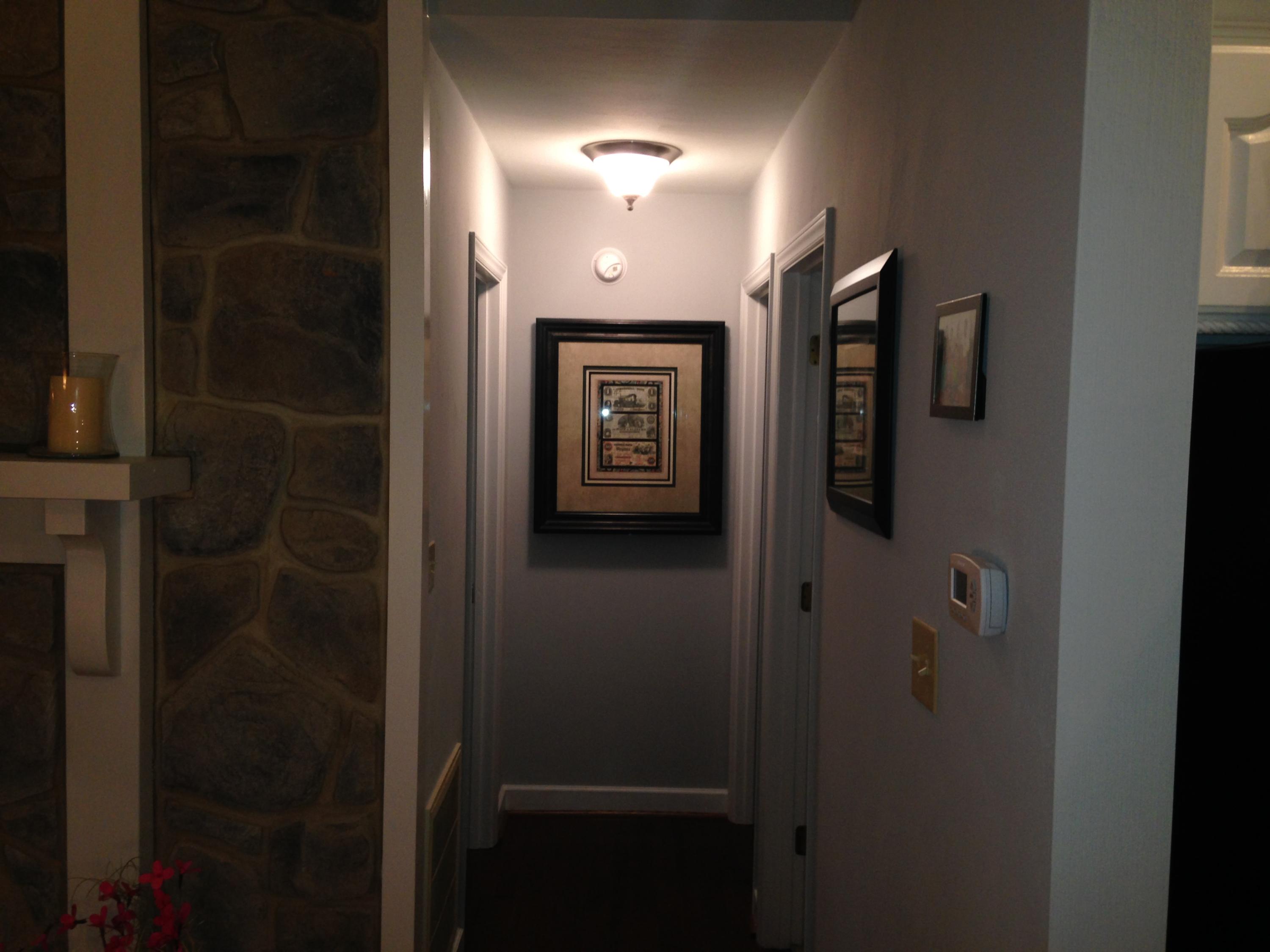 2205 Ridge Road Roanoke, VA 24014 - Photo 29 of 62 a view of a hallway with paintings on the wall