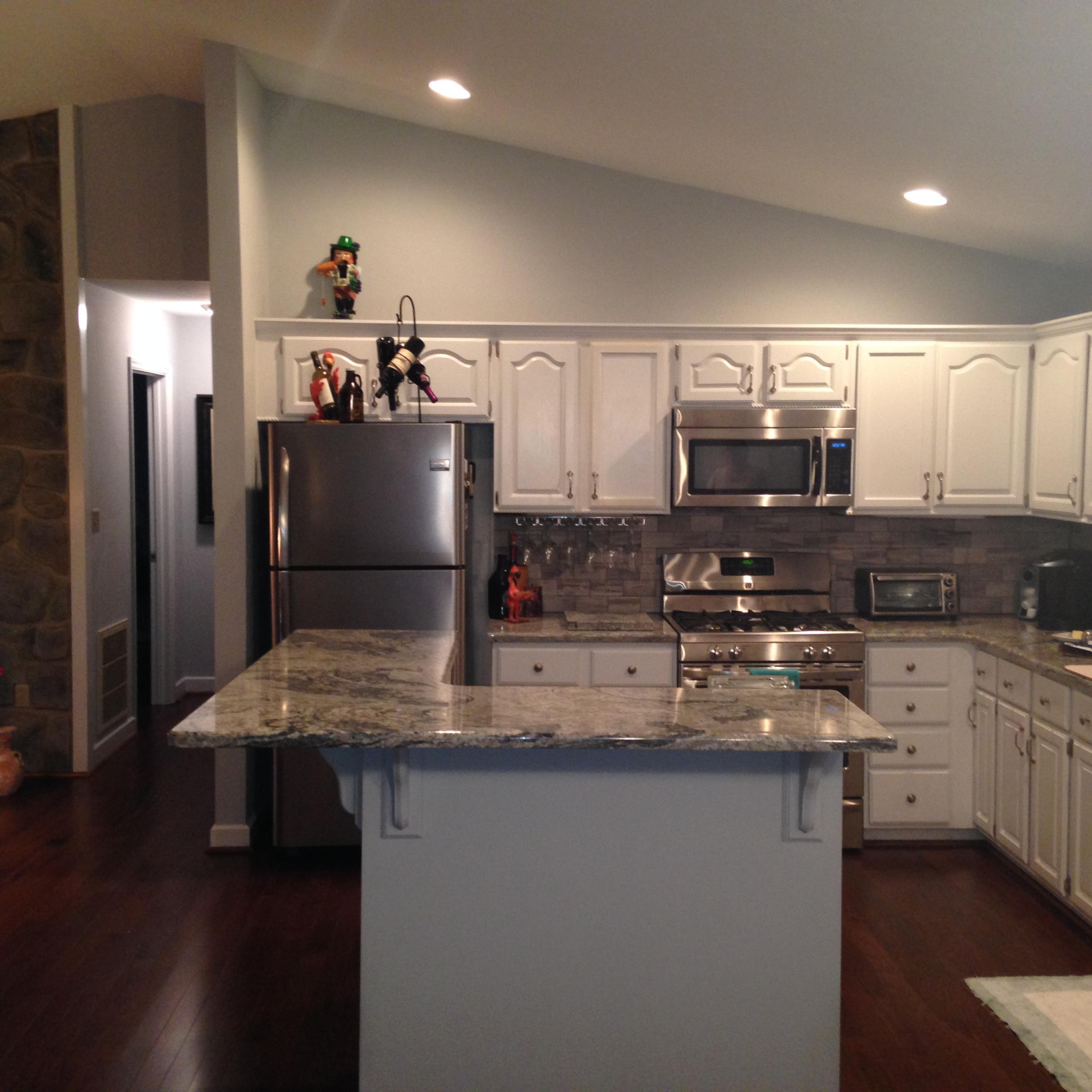 2205 Ridge Road Roanoke, VA 24014 - Photo 40 of 62 a kitchen with stainless steel appliances granite countertop a sink a stove and a refrigerator
