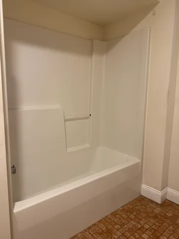 a bathroom with a bathtub