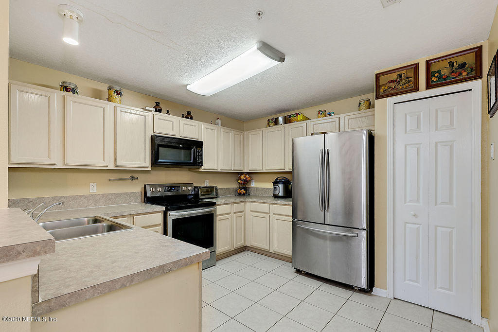 7920 Merrill Road, Unit 2110 Jacksonville, FL 32277 - Photo 7 of 20 Kitchen 3