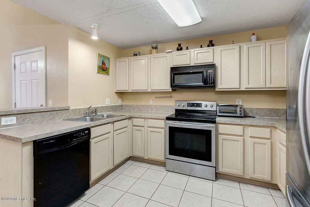 7920 Merrill Road, Unit 2110 Jacksonville, FL 32277 - Photo 8 of 20 Kitchen 4