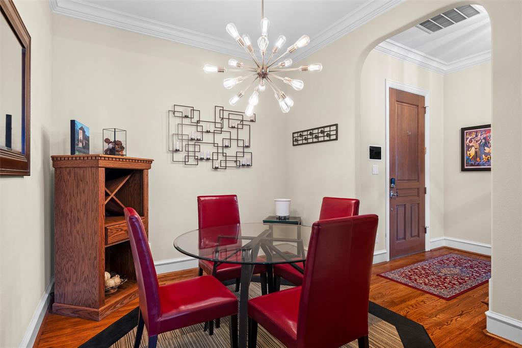 4931 Milam Street Dallas, TX 75206 - Photo 4 of 30 a dining room with furniture and wooden floor