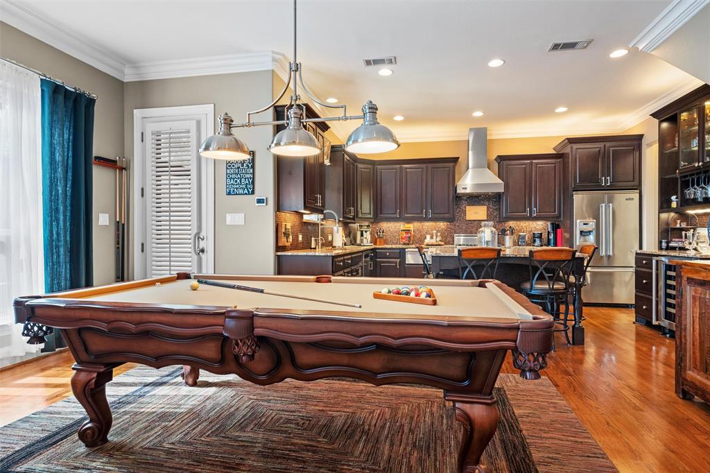 4931 Milam Street Dallas, TX 75206 - Photo 9 of 30 a outdoor dining space with furniture and wooden floor