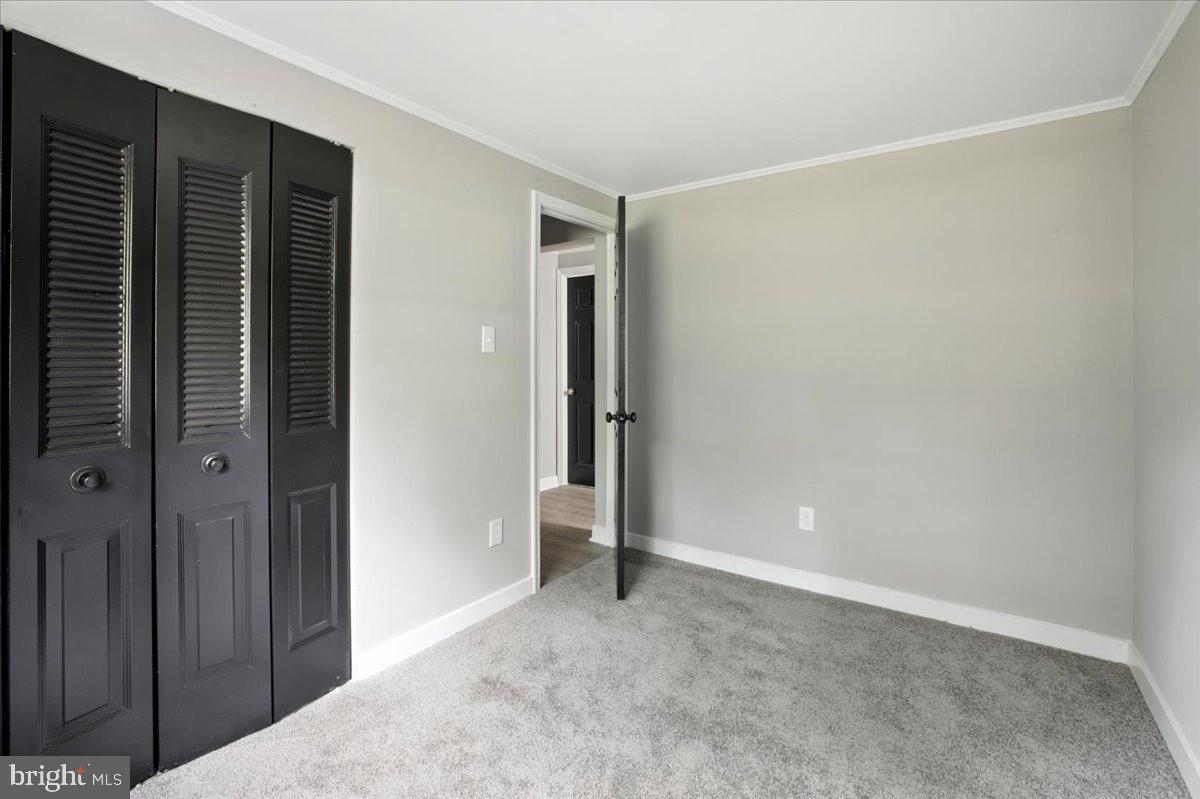 7102 Tanglewood Road Spotsylvania, VA 22551 - Photo 11 of 26 Modern space with sleek black accents.
