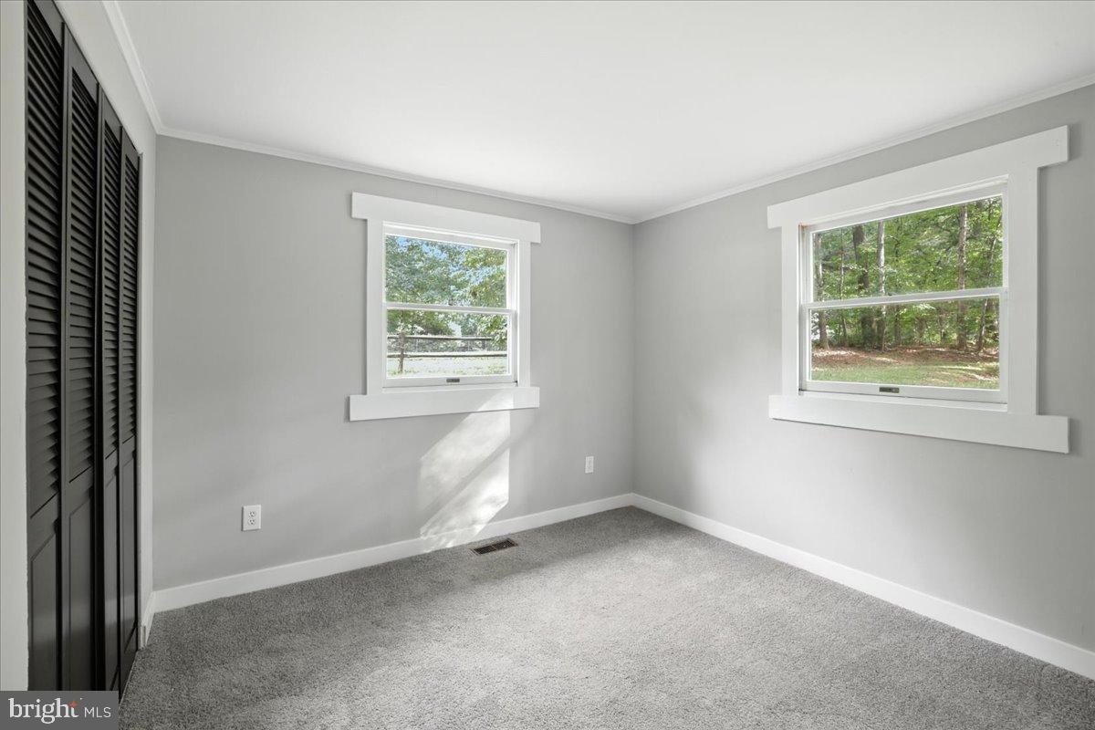 7102 Tanglewood Road Spotsylvania, VA 22551 - Photo 12 of 26 Bright and airy room with natural light.