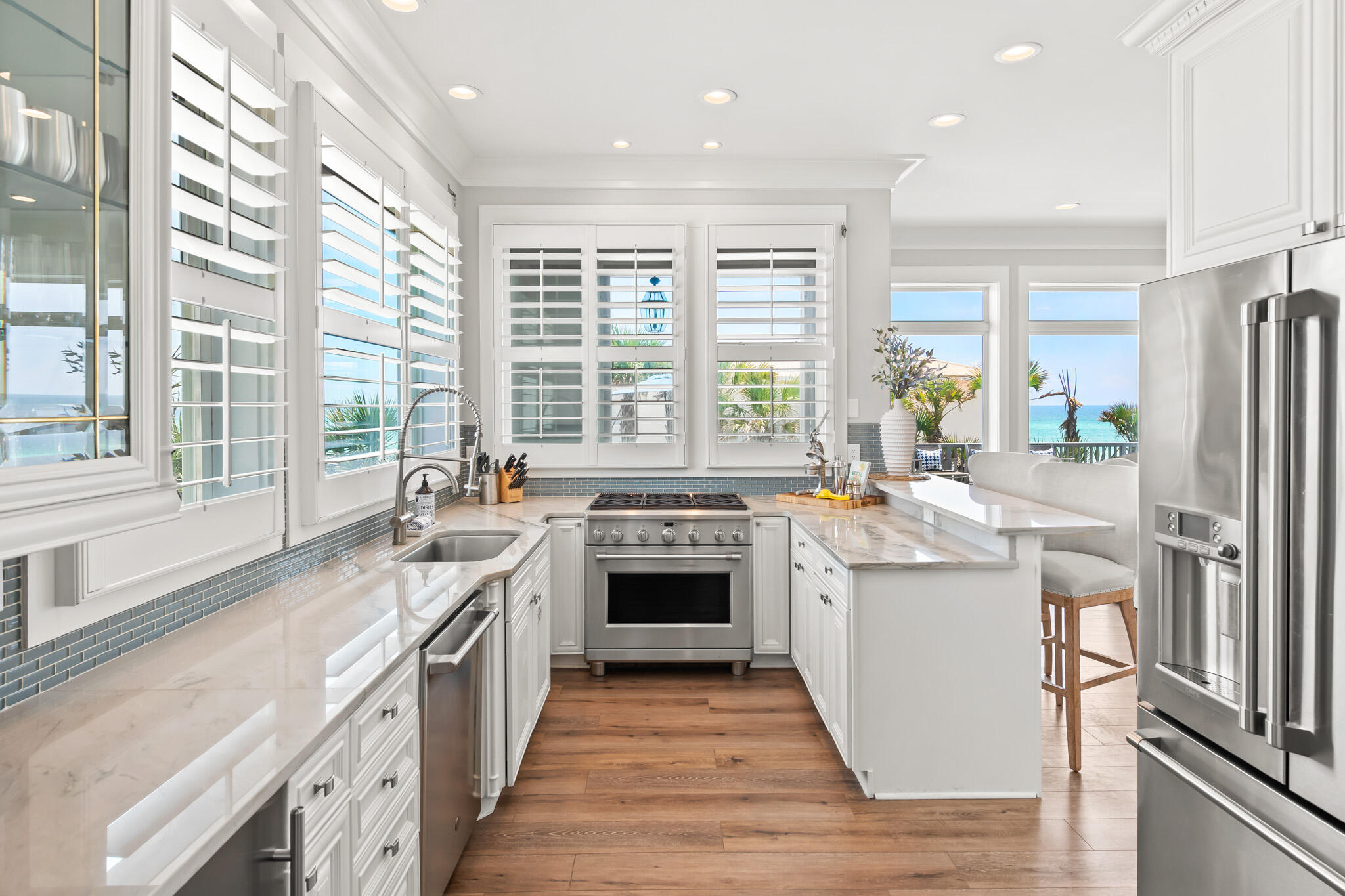 15 Fort Panic Road Santa Rosa Beach, FL 32459 - Photo 41 of 84 a kitchen with stainless steel appliances a stove sink and refrigerator