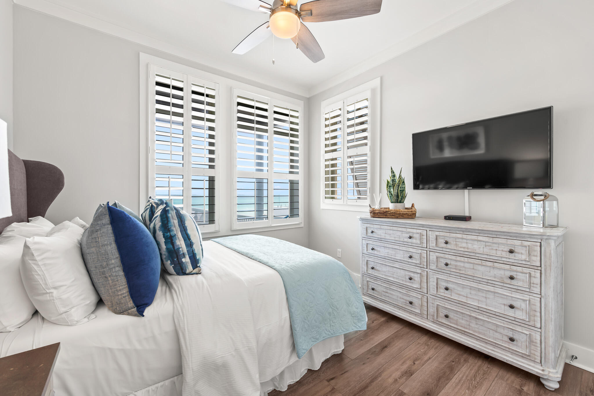 15 Fort Panic Road Santa Rosa Beach, FL 32459 - Photo 50 of 84 a bedroom with a large bed and a flat screen tv