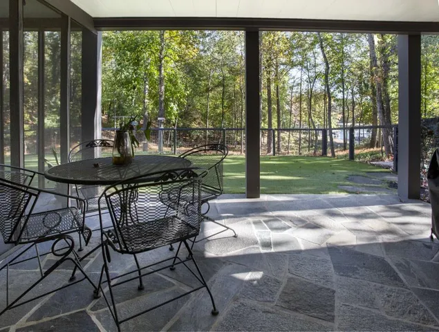 a view of a park with large trees