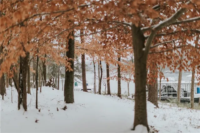 a view of a balcony with two chairs