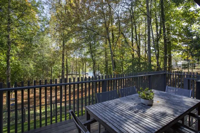 a view of a back yard from a balcony