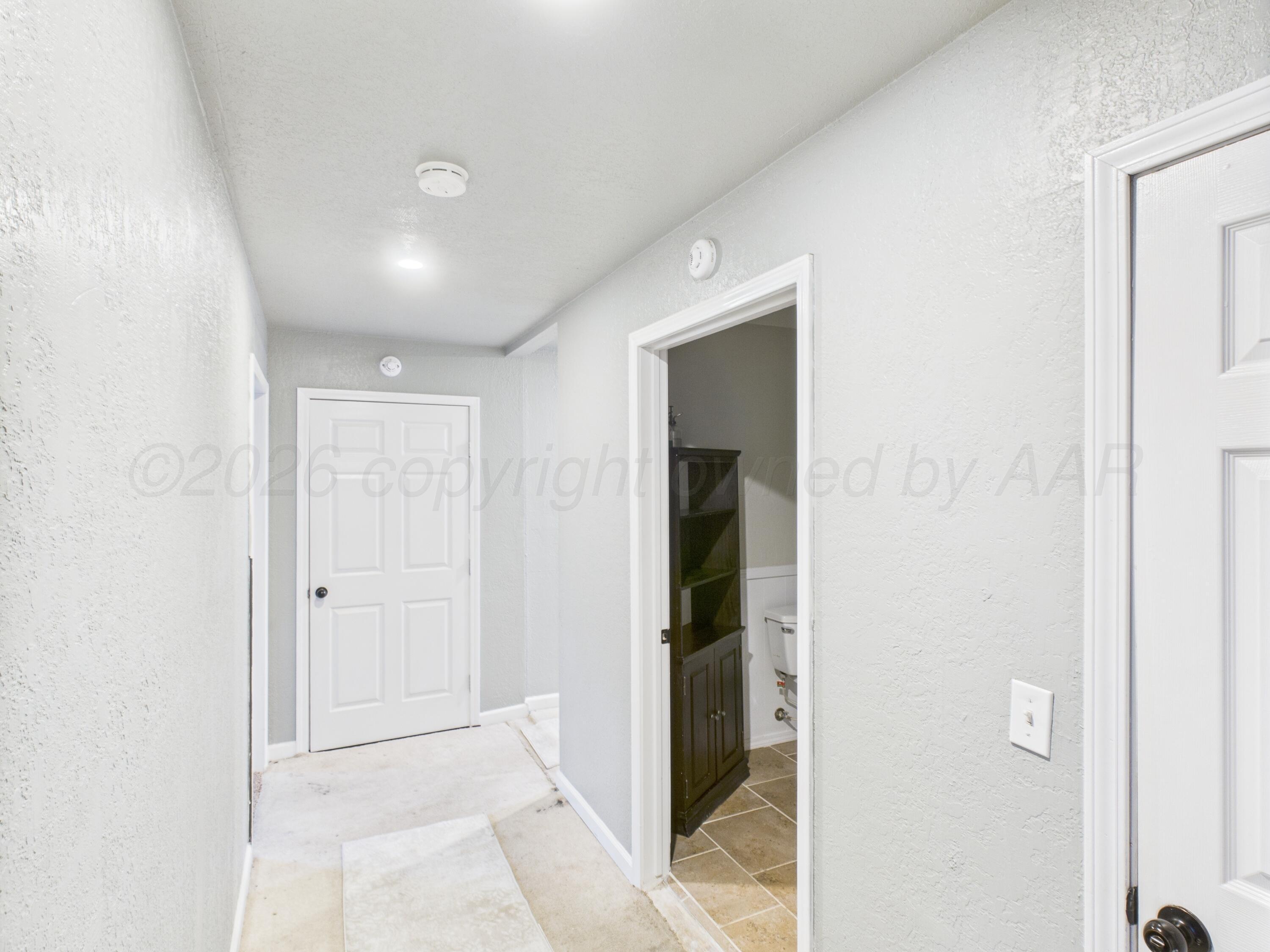 505 South Ridgeland Avenue Fritch, TX 79036 - Photo 17 of 19 a view of an empty room