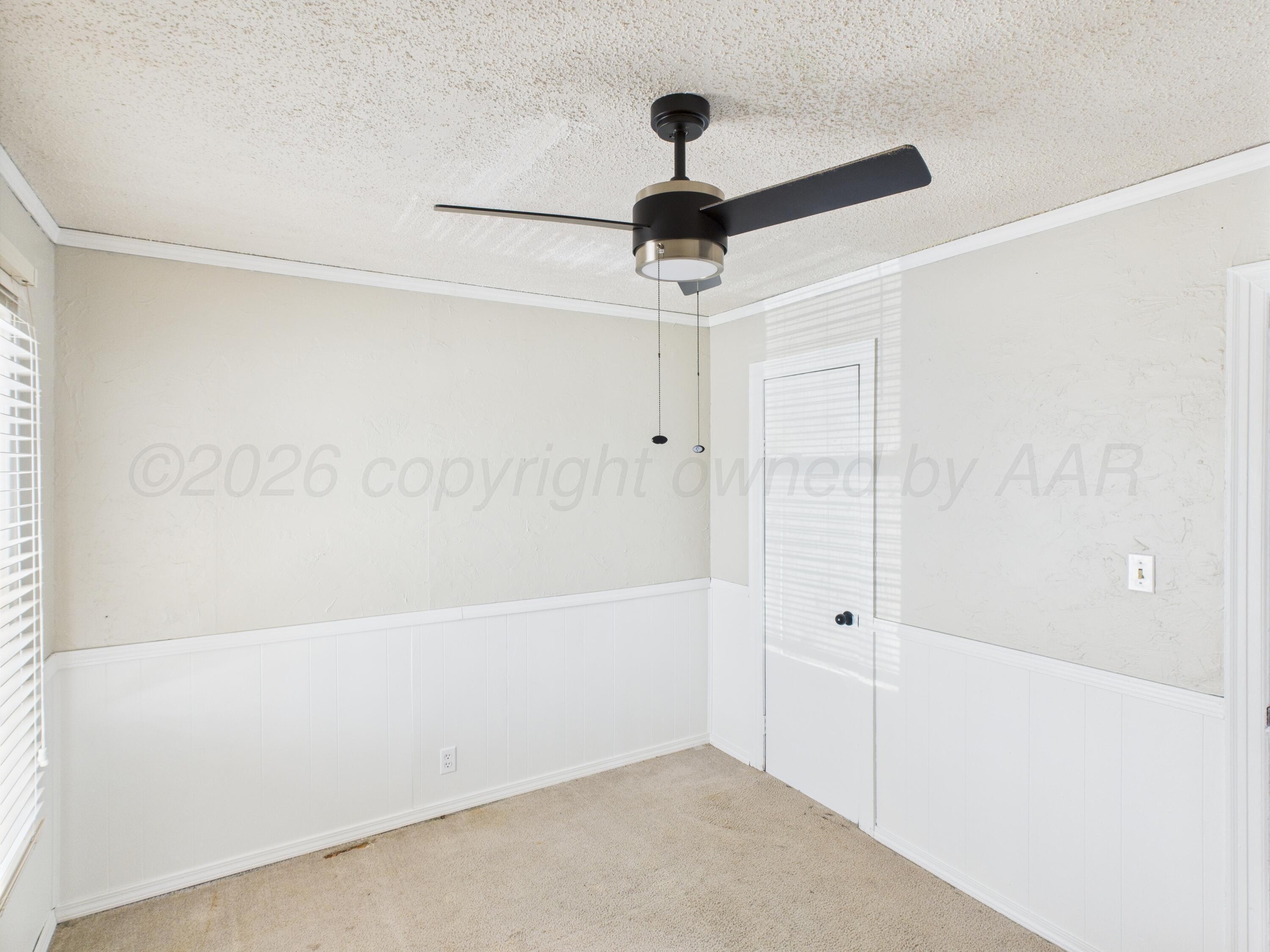 505 South Ridgeland Avenue Fritch, TX 79036 - Photo 9 of 19 a bathroom with a shower