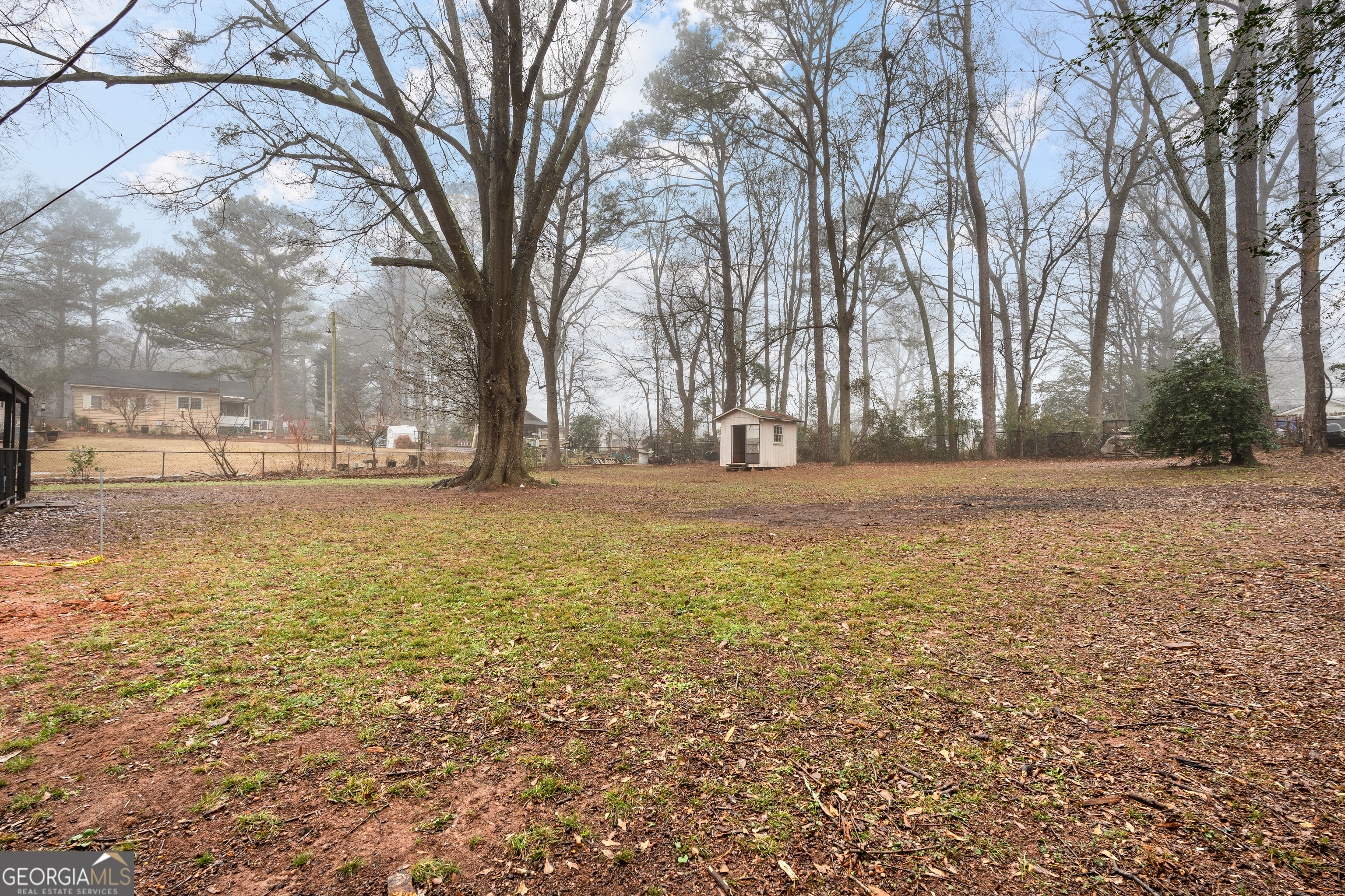 96 Poplar Road Newnan, GA 30263 - Photo 32 of 33 a view of outdoor space with trees